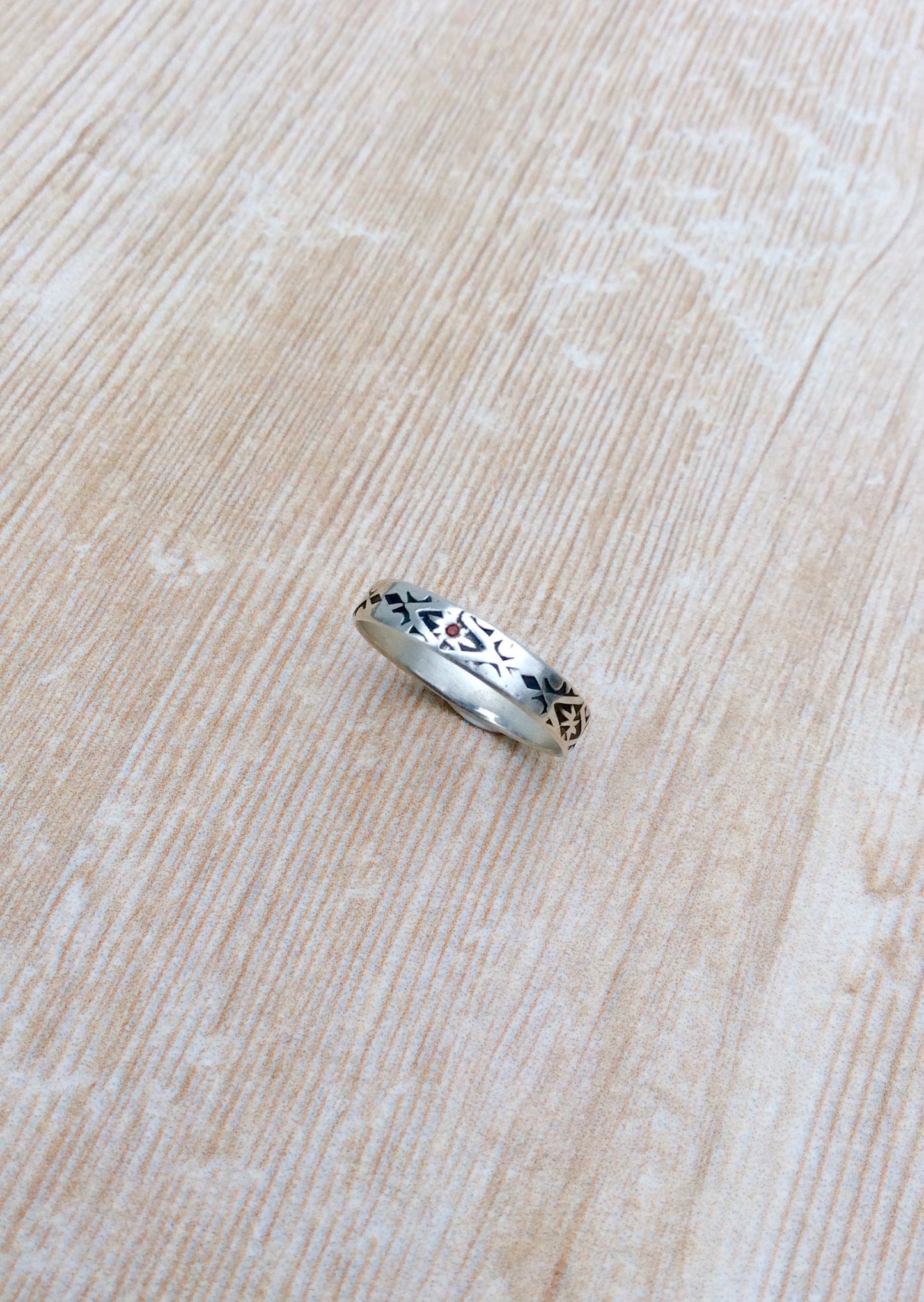 Aztec Stamped Flush-Set Garnet Ring